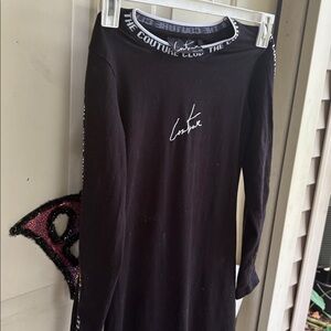 The couture Club Embroidery washed out black cotton . Size M